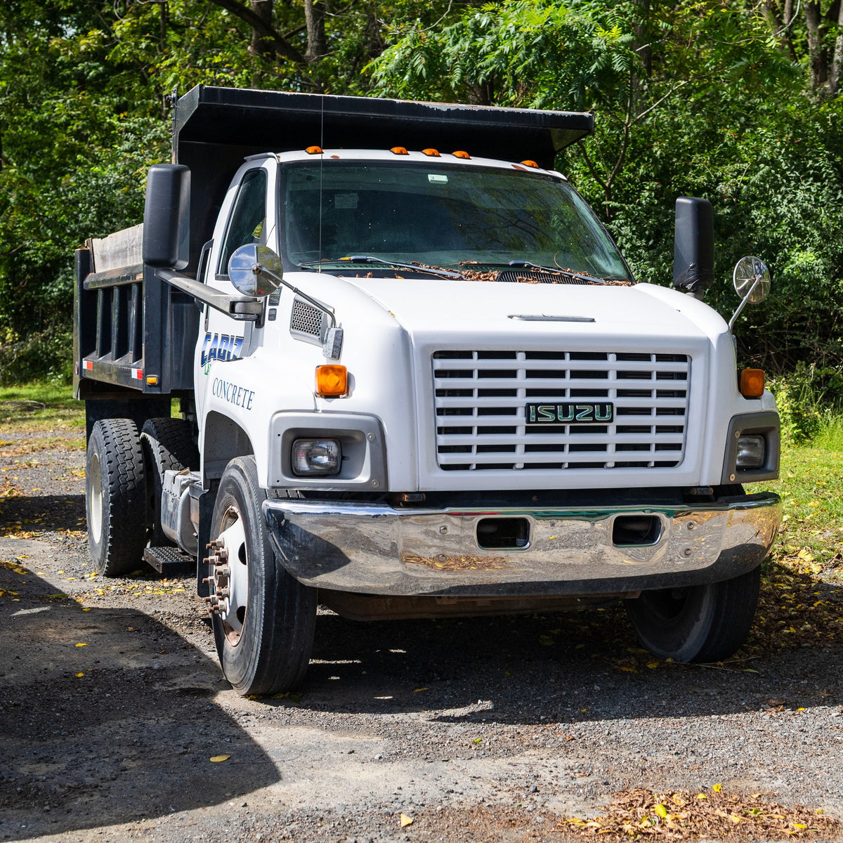 Medium duty dump truck serviced by Full Send Diesel
